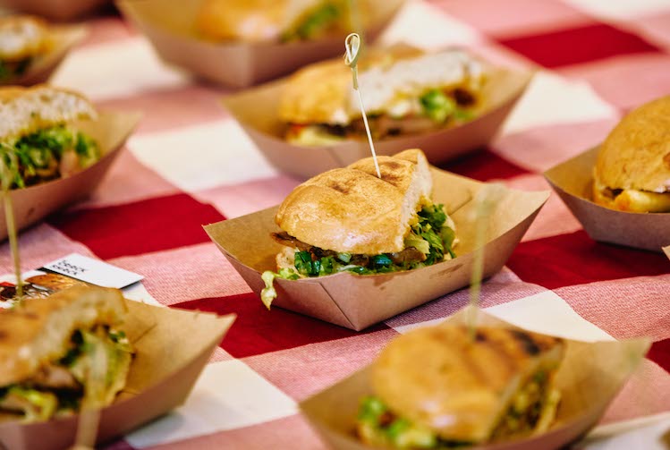 The Crack Shack California Dip sandwich on checkered table cloth.