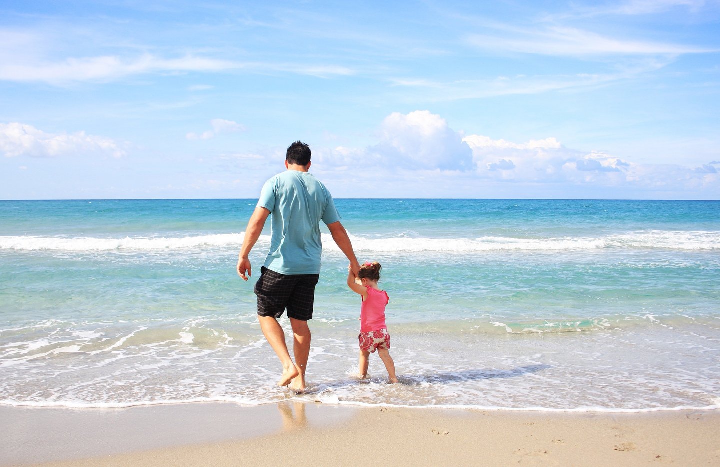 What to do in Costa Mesa Father and daughter at the beach