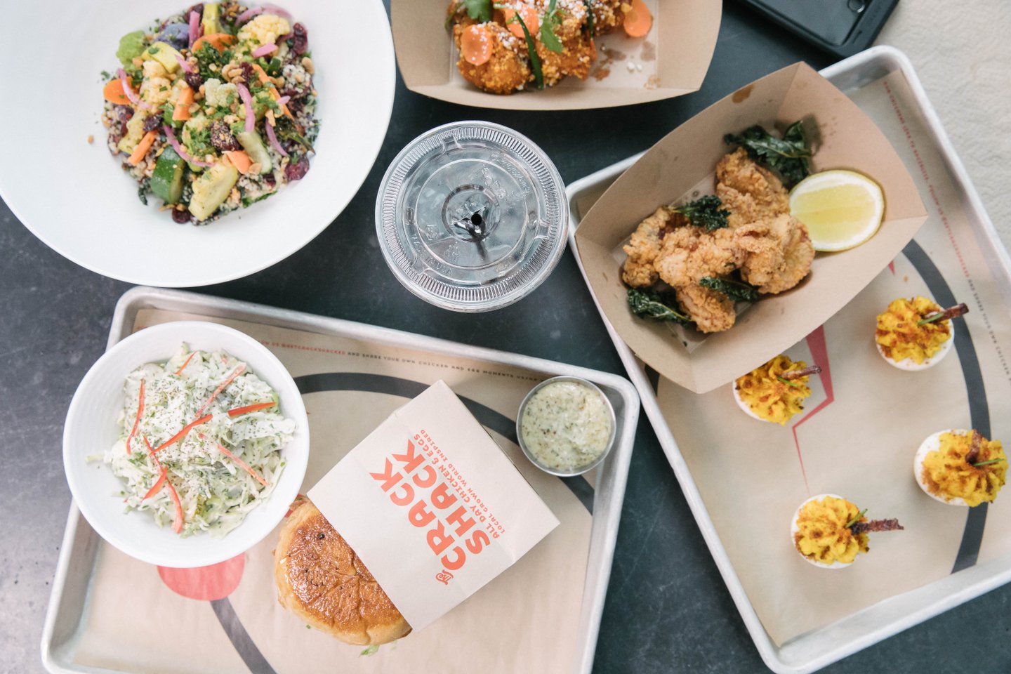 What to eat in Costa Mesa Table of food from The Crack Shack