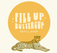 Logo for Fill Up Buttercup Refill Shop featuring bold, retro-style text inside a large yellow circle, with an illustrated leopard lying down in front of the circle.