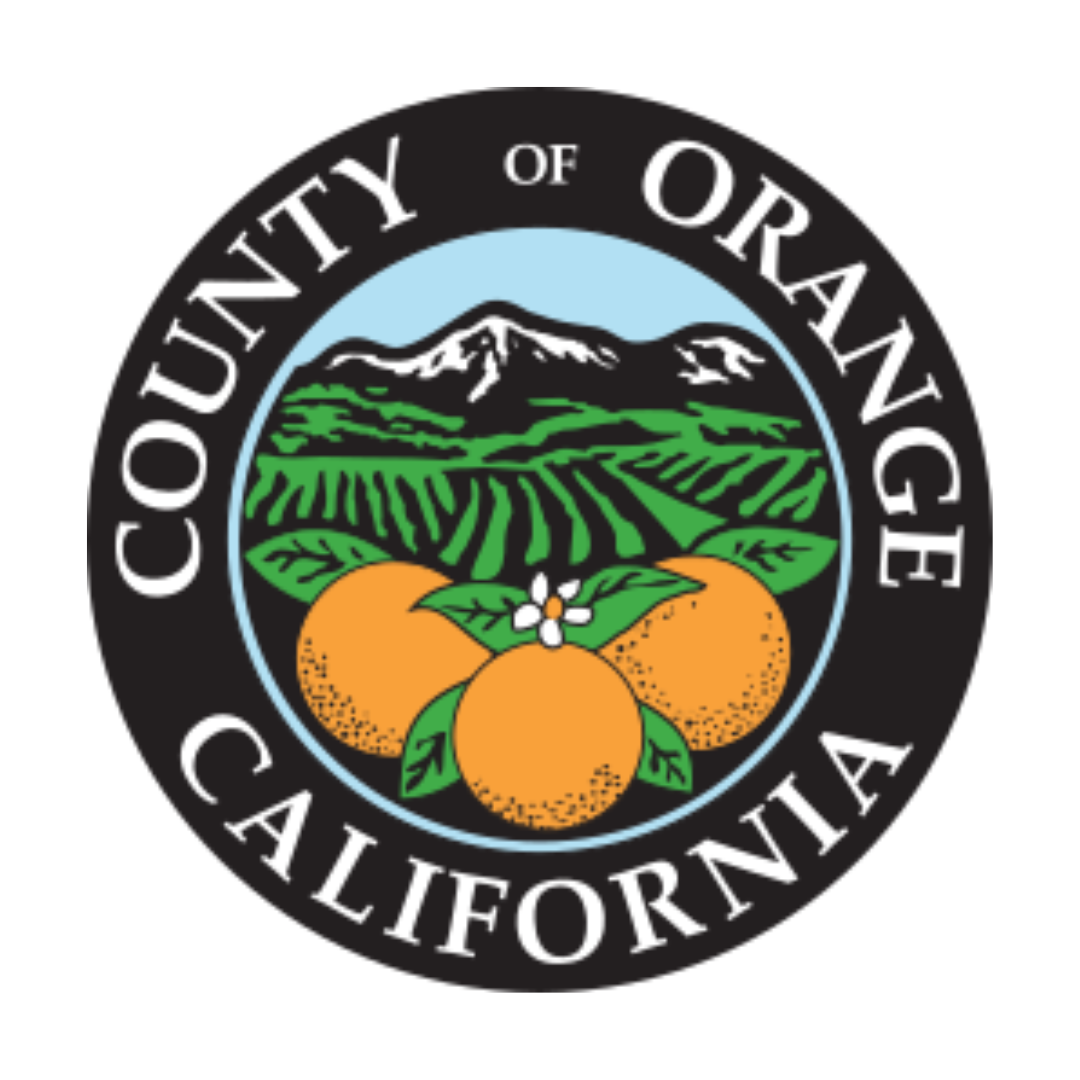 County of Orange, California seal featuring three oranges with leaves and a white flower in front of green fields and mountains, all within a circular black border with white text.