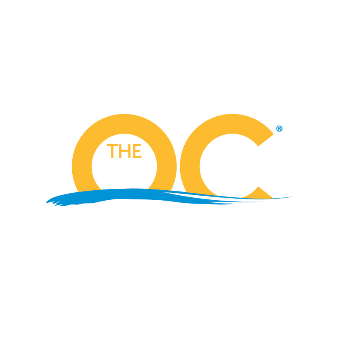 Yellow text reading THE OC with THE inside the O. A blue wave graphic runs beneath the letters, all set against a white background.