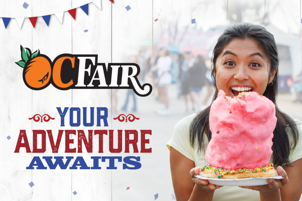 A smiling woman holds a large pink cotton candy at a fair. Text reads: OC Fair. Your adventure awaits. July 17 - Aug 16. Tickets on sale now! The background is lively with festive decorations.